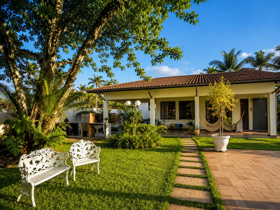 Casa, jardim e varanda da Casa Soul Sol